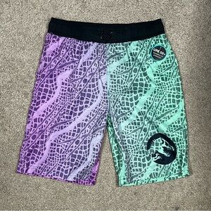 NWT Jurassic Park Purple Green Boys Swim Trunks Multicolor Patterned Shorts S/M
